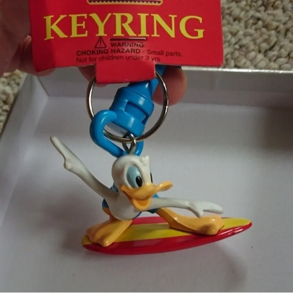 New vintage Donald Duck surfboard keychain with clip